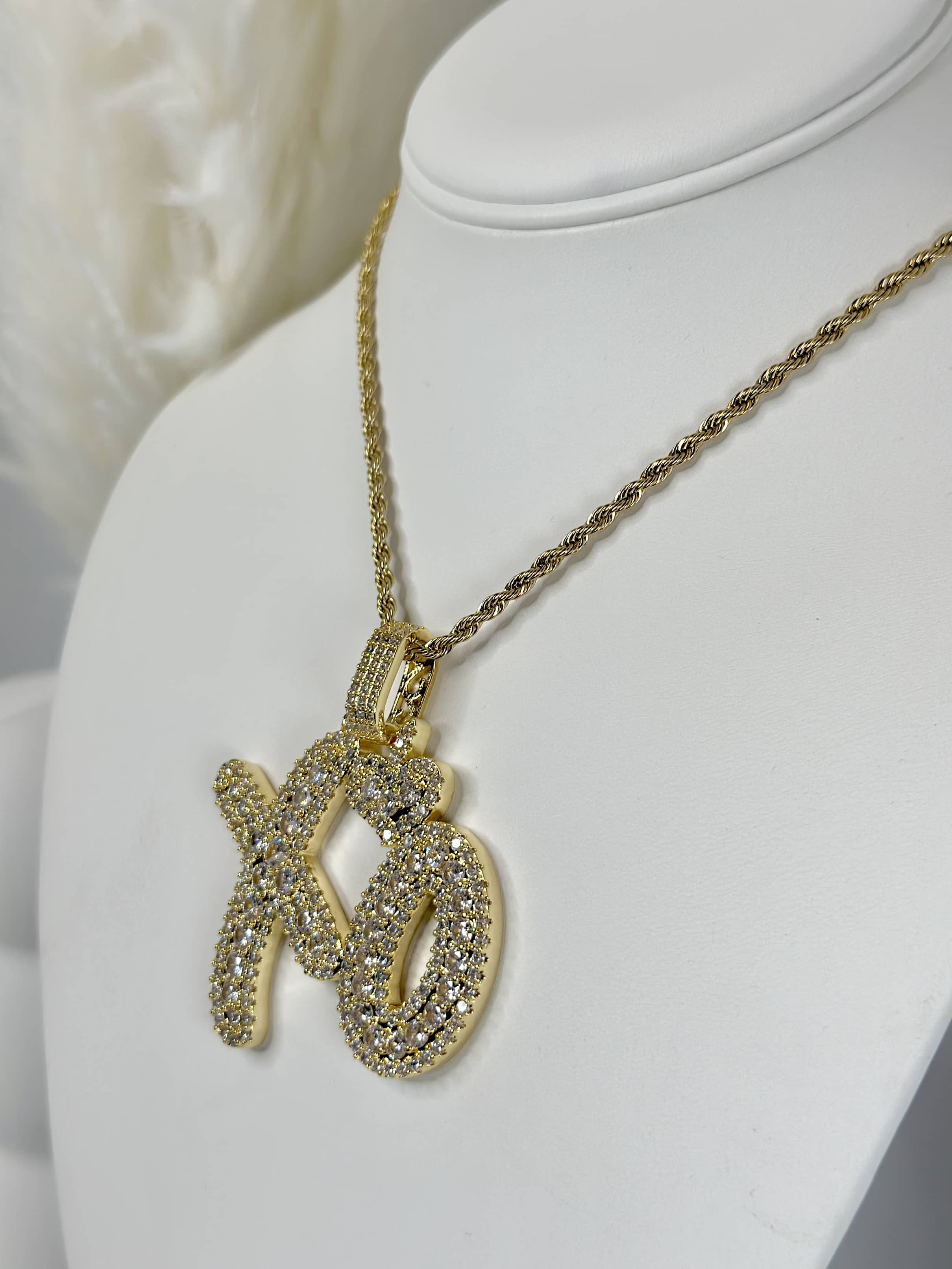 10 ct. t.w. Diamond XO Pendant Necklace in Sterling Silver. 18